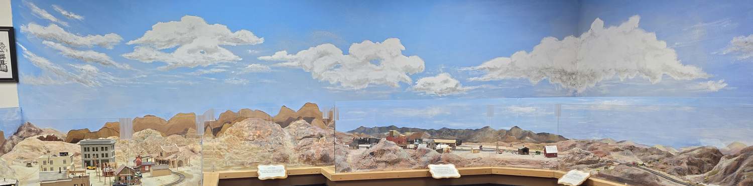 Painted desert horizon and modeled terrain in the museum's Las Vegas and Tonopah railroad room.
