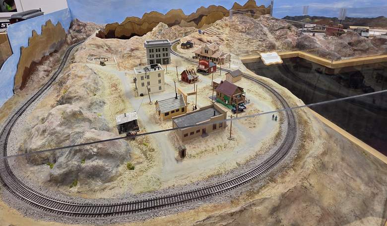 Modeled town buildings and figures in the museum's diorama of the valley.